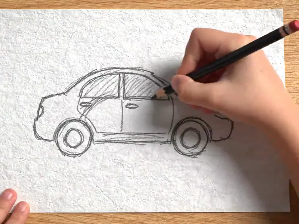 Drawing to life : le dessin d’une voiture au crayon sur papier